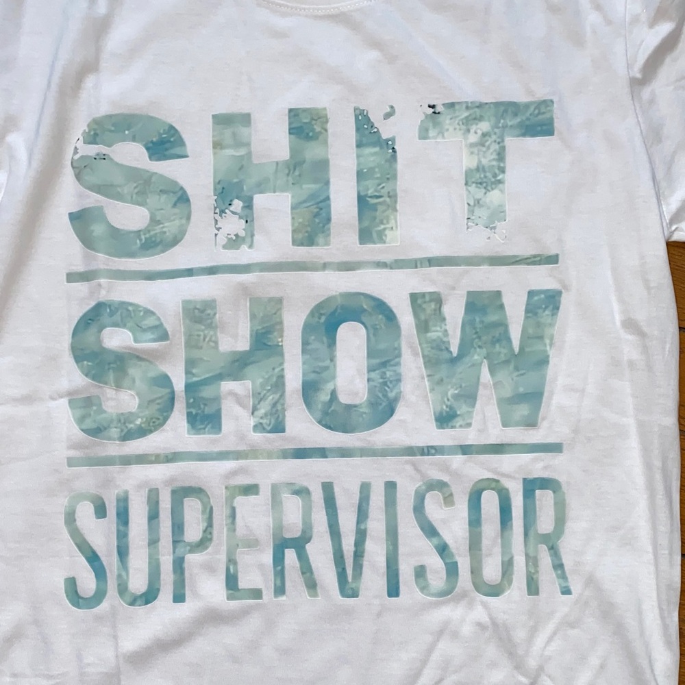 White Graphic Tee with Blue Text